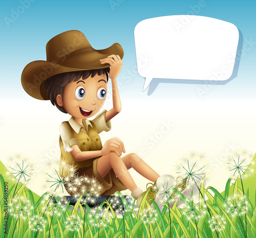 A boy wearing a hat sitting with an empty callout