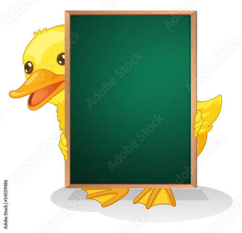 A duckling holding a blackboard photo