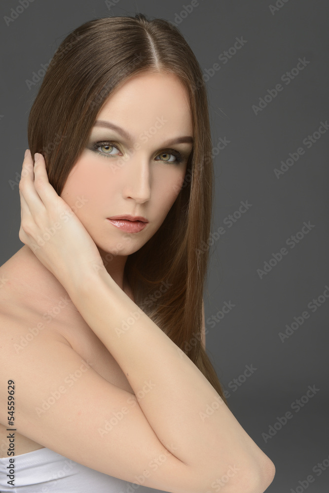 young sexy girl with long hair-gray background young sexy girl with long hair-gray background