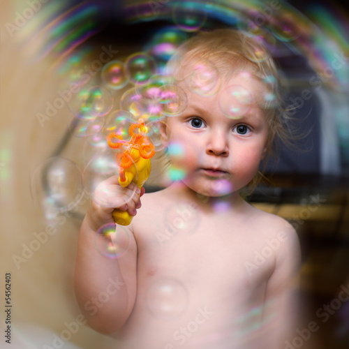 Little boy and soap bubbles