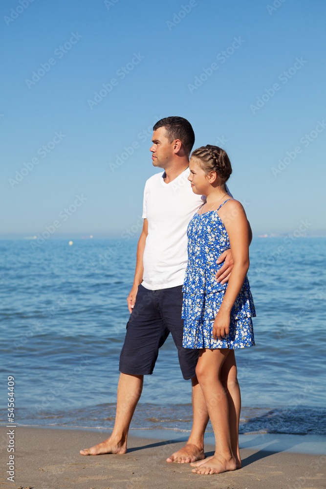 Happy father and his little daughter at beach Happy father and his little daughter at beach