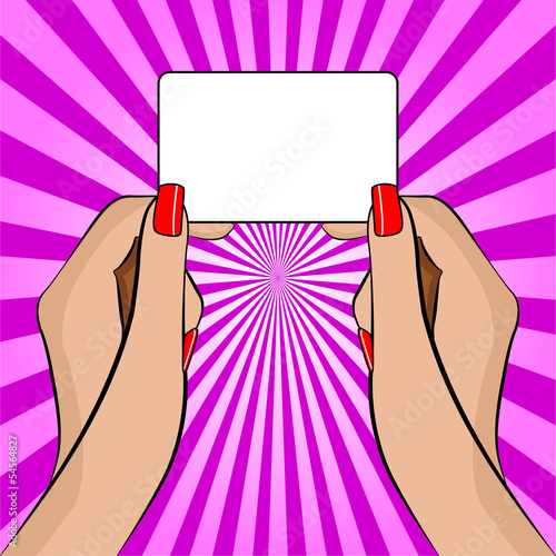 Womans hand holding a piece of paper