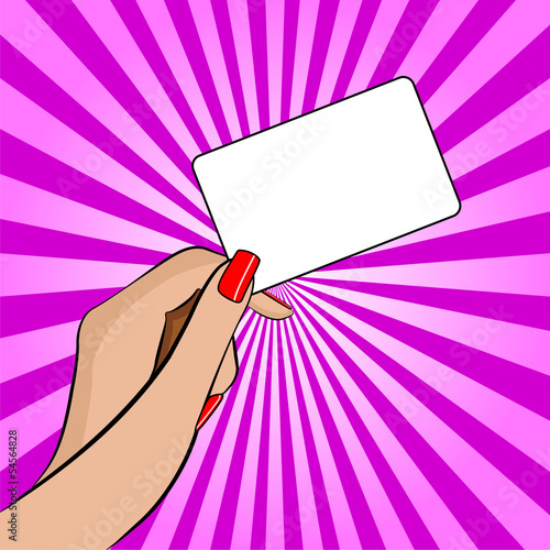 Womans hand holding a piece of paper