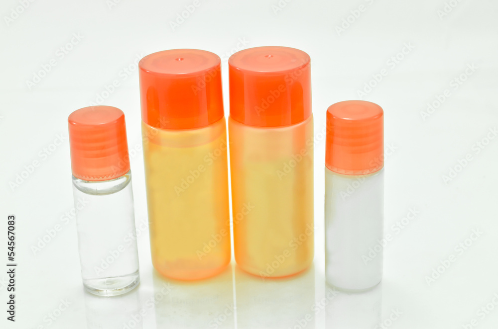Bottle and tube containers of sun cream and lotion isolated on w Bottle and tube containers of sun cream and lotion isolated on w