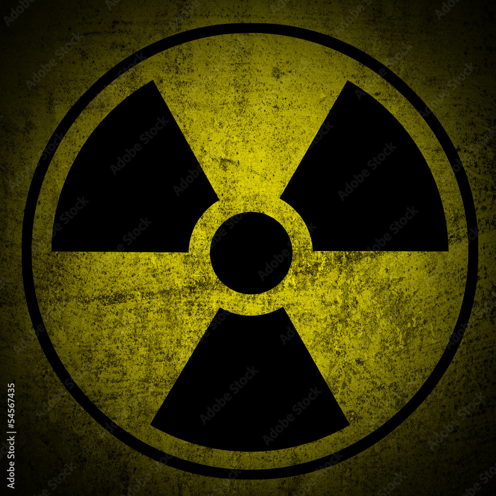 Fototapeta premium Ionizing radiation hazard symbol on grunge texture.
