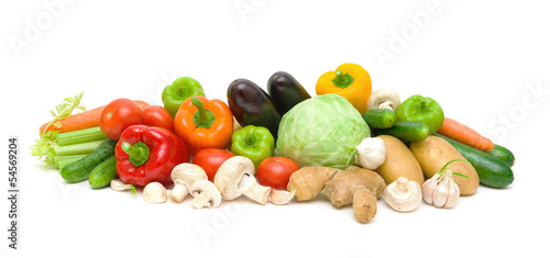 still life of vegetables and mushrooms on a white background