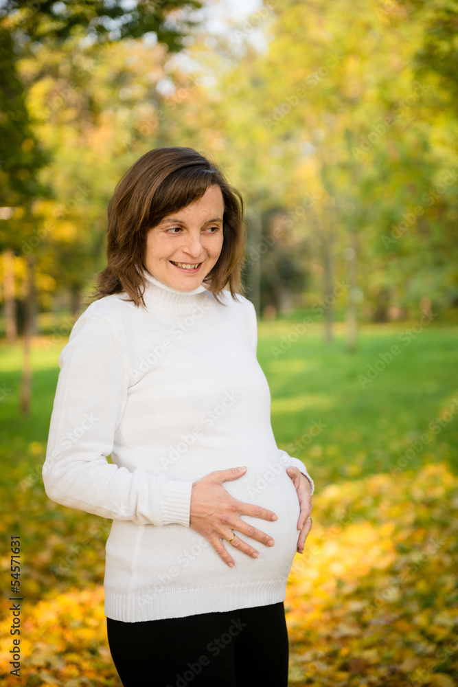 Expecting - pregnant woman outdoor Expecting - pregnant woman outdoor