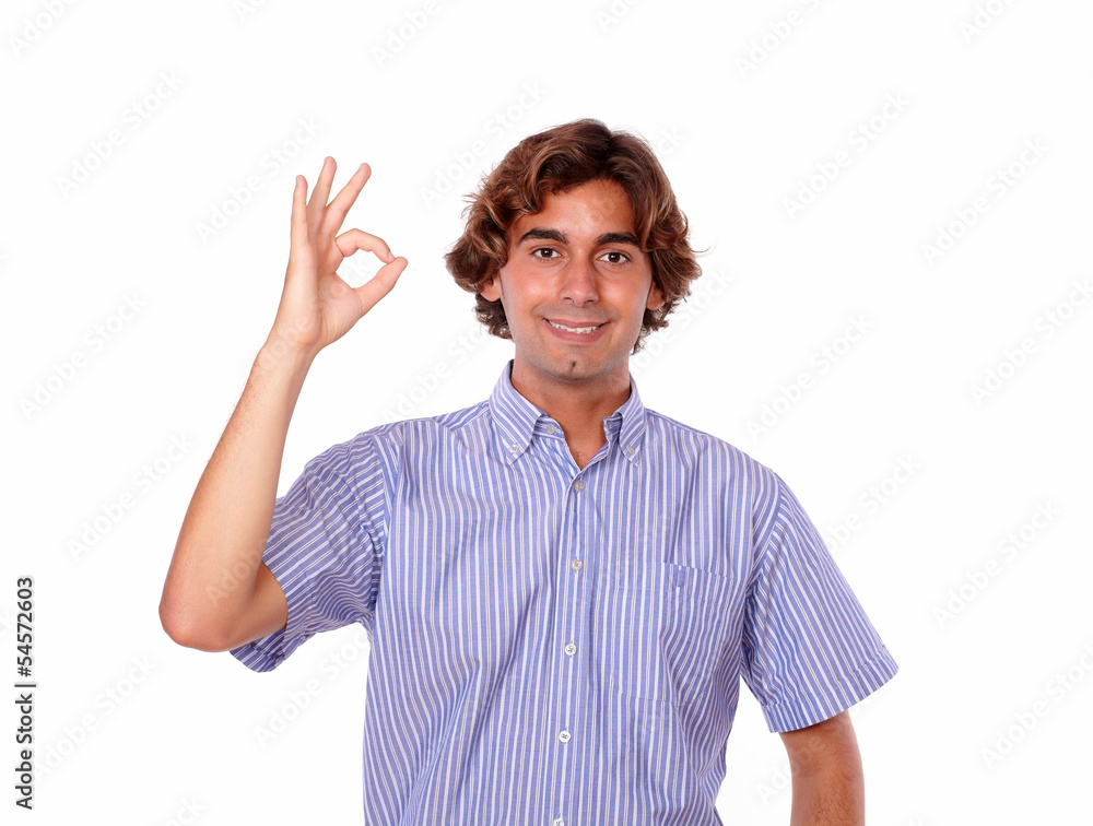 Handsome man smiling and showing people ok sign Handsome man smiling and showing people ok sign