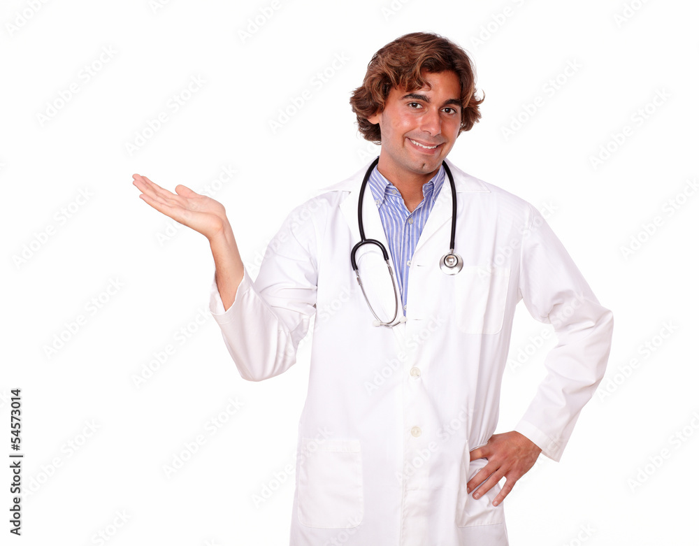 Handsome medical doctor holding out his palm Handsome medical doctor holding out his palm