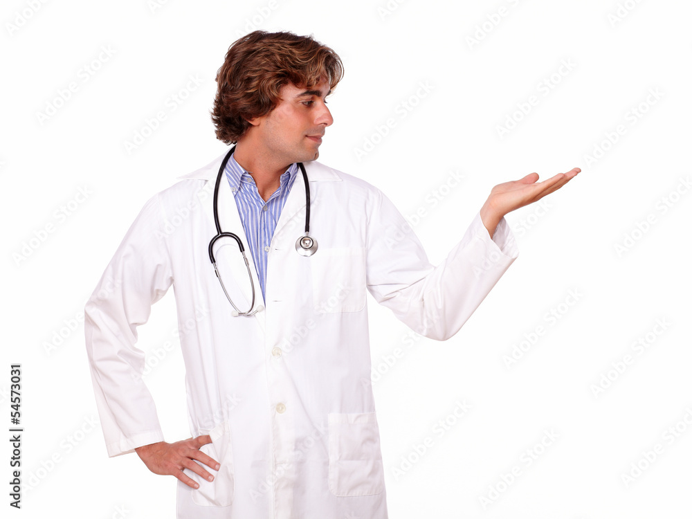 Profesional medical doctor holding out his palm Profesional medical doctor holding out his palm