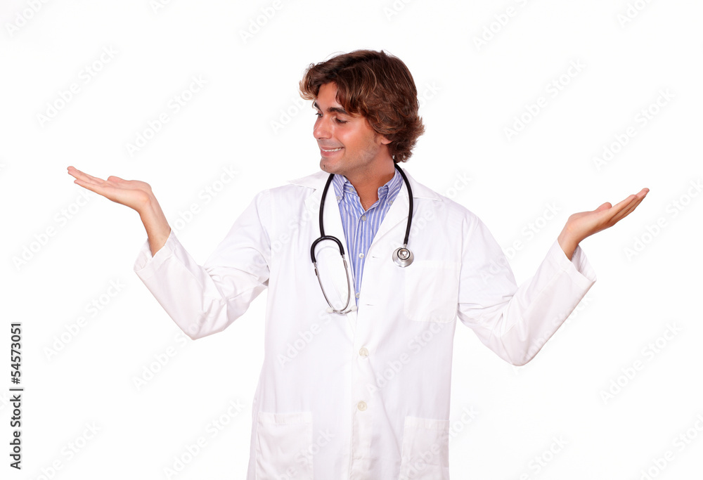 Charming medical doctor holding out his palms Charming medical doctor holding out his palms