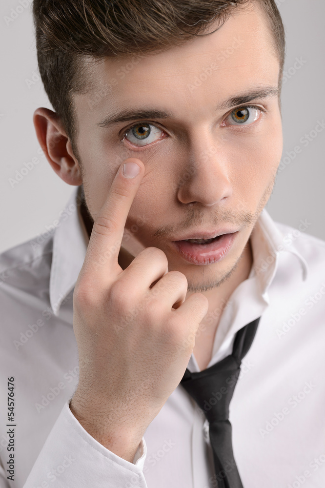 Exhausted businessman. Portrait of tired businessman pointing hi Exhausted businessman. Portrait of tired businessman pointing hi