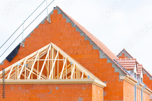 Obraz na płótnie construction d'une maison en brique rouge