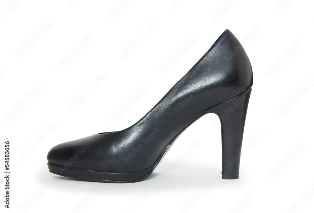 Close-up of female high-heeled shoe over white background Close-up of female high-heeled shoe over white background