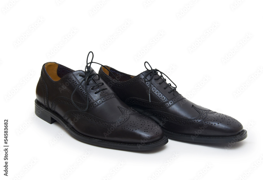 The black man's shoes isolated on white background. The black man's shoes isolated on white background.