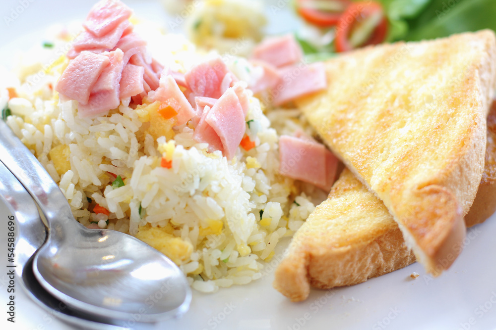 Fried rice with ham, served with toast Fried rice with ham, served with toast