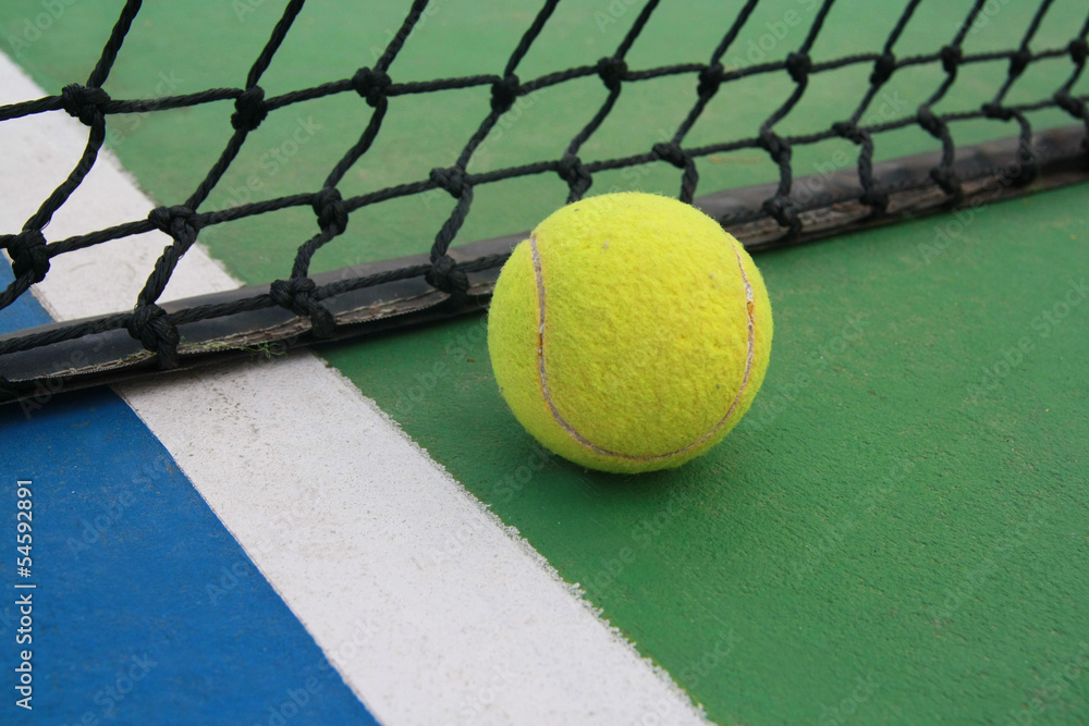 tennis on court with net