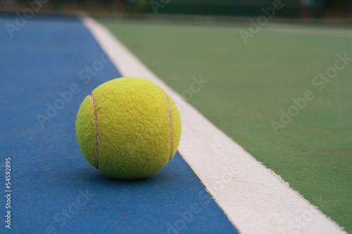 Tennis Ball on the Court © Auttapon Moonsawad
