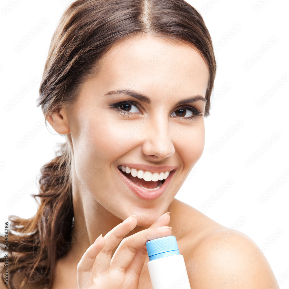 Smiling woman showing medical drug, isolated Smiling woman showing medical drug, isolated