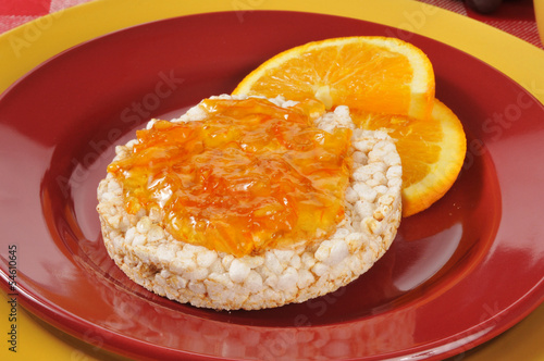 Orange marmalade on a rice cake