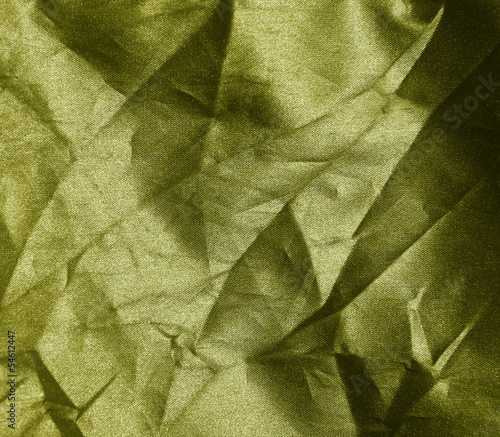 crumpled yellow fabric background photo