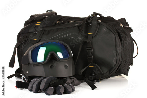 Winter sport glasses, helmet and gloves, backpack, isolated
