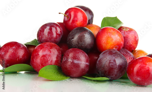 Ripe plums isolated on white