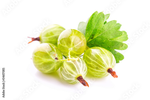 Gooseberries with leaves on white background