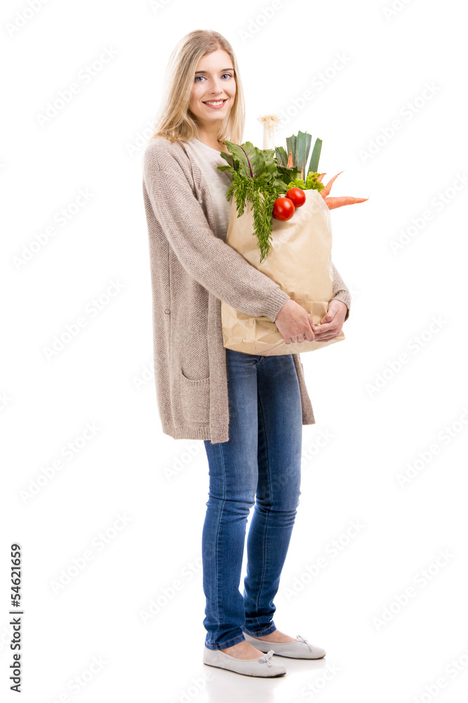 Beautiful woman carrying vegetables Beautiful woman carrying vegetables
