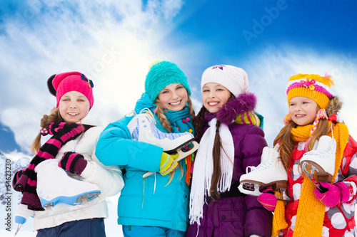 Four girls going ice skating