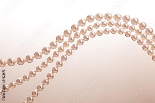 Chains of white pearls forming an ornament