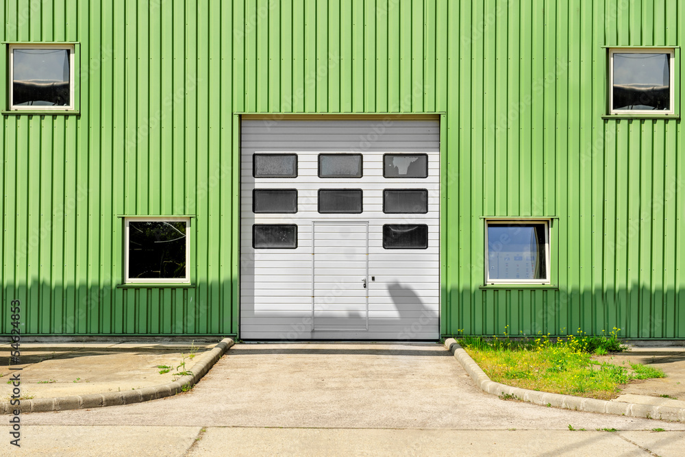 Large industrial door on a warehouse Large industrial door on a warehouse