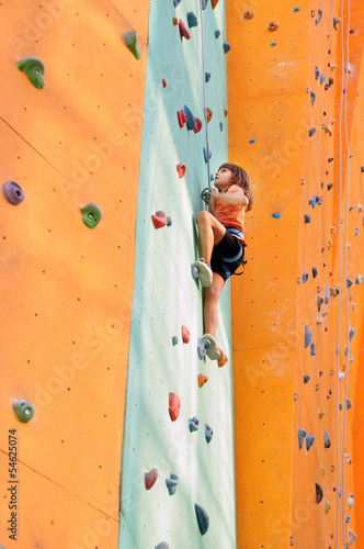 child studying climbing at the climbing centre