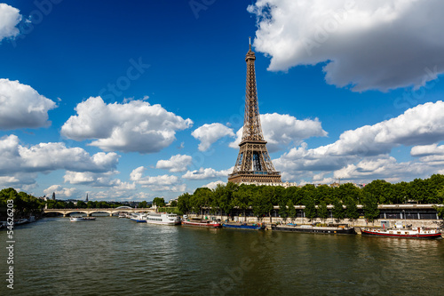 Eiffel Tower and Seine River with White Clouds in Background, Pa © anshar73
