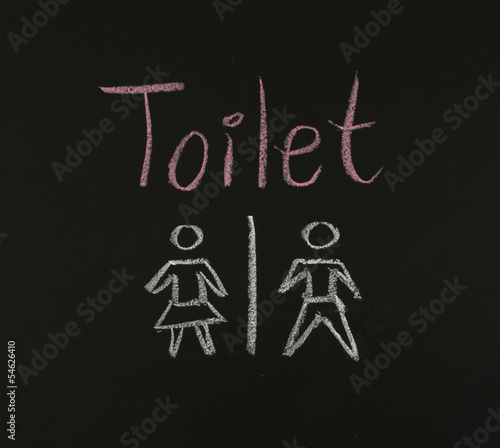 toilet sign on blackboard