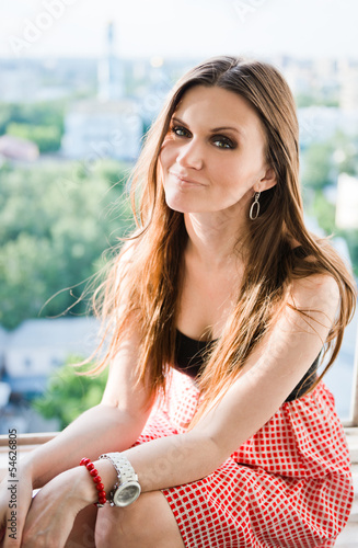 Pretty young woman outdoor with smoky eye makeup