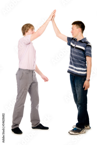Two businessmen give each other a high five