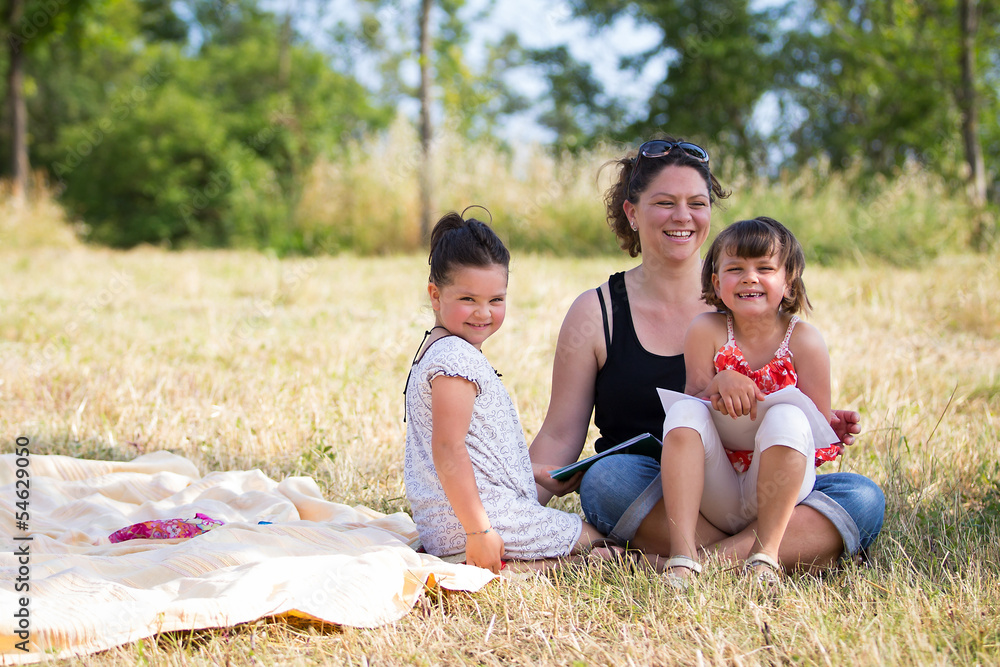 happy family smiling on the wheat at park, outdor potrait