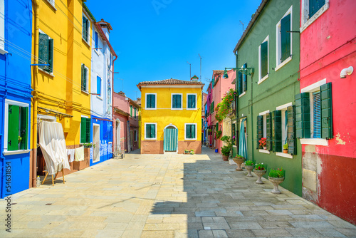 Venice landmark, Burano island street, colorful houses, Italy © stevanzz