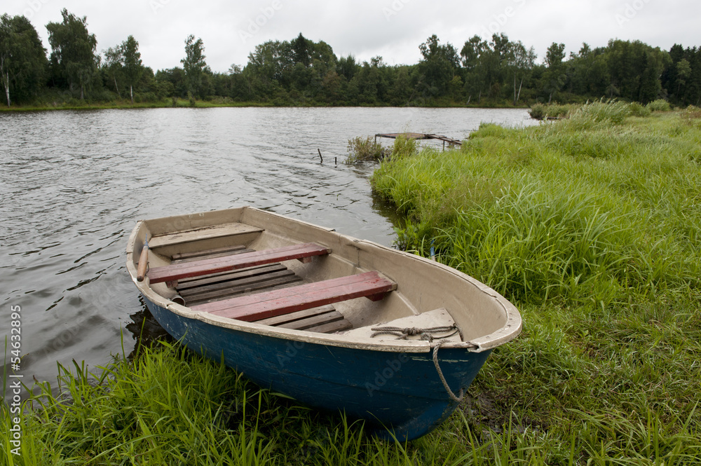 Fishing boat on the shore of Lake Fishing boat on the shore of Lake