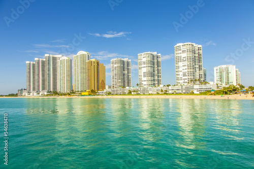 beautiful beach with condomiums and skyscraper in Sunny Islands © travelview