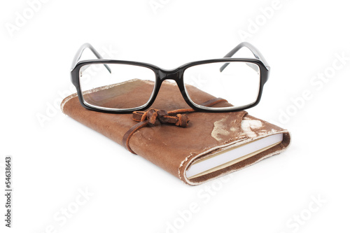 glasses with notebook