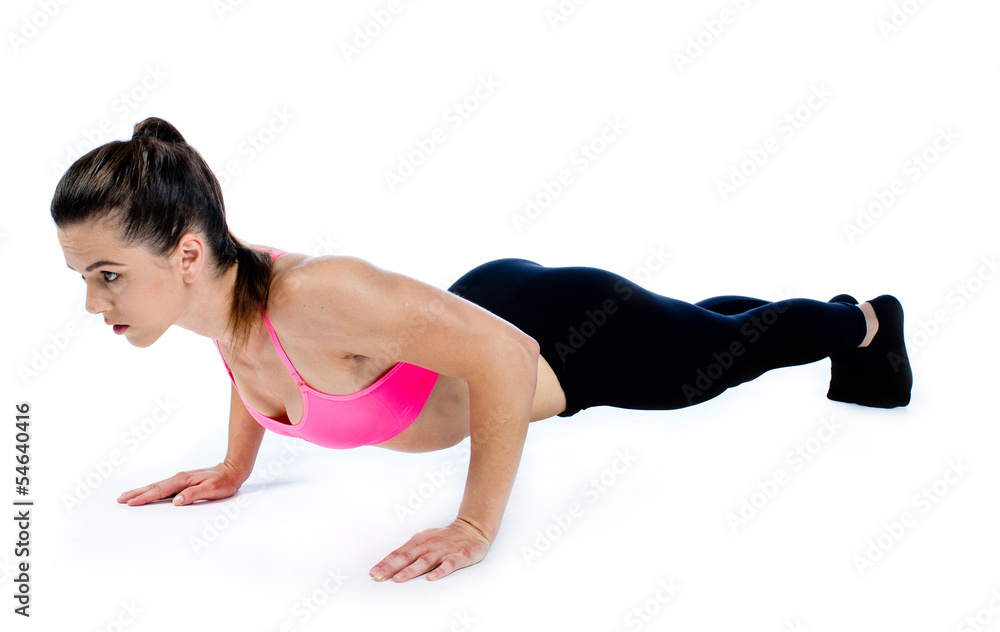 woman doing push ups isolated woman doing push ups isolated