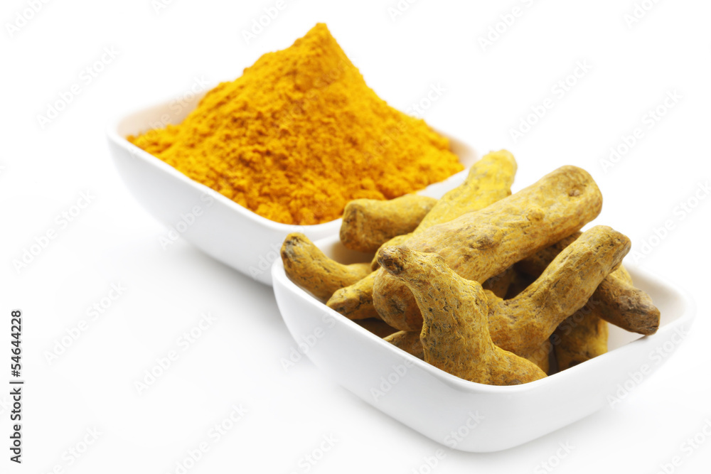 Turmeric Root and Powder on white Background