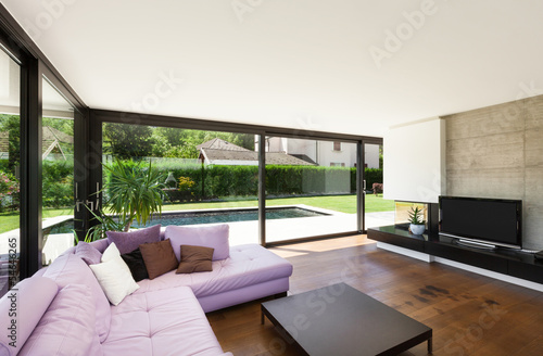 Modern villa  interior  wide living room with pink divan