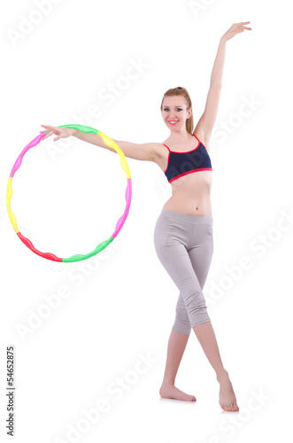 Woman doing exercises with hula hoop