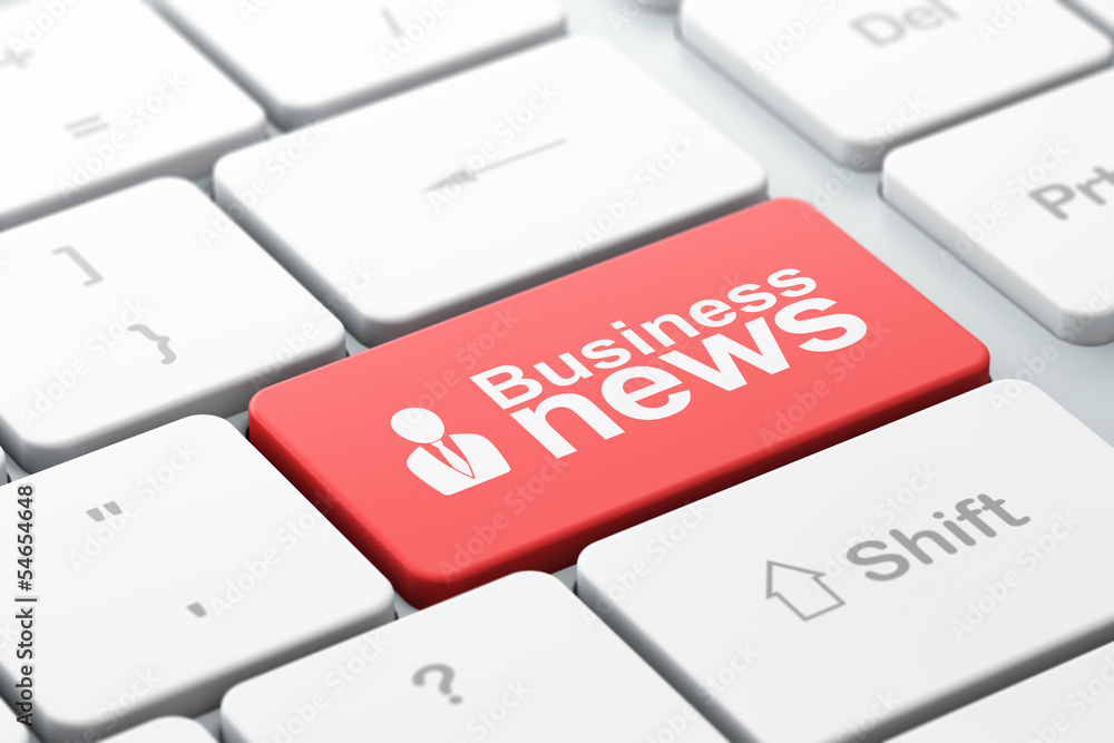 News concept: Business Man and Business News on computer keyboar News concept: Business Man and Business News on computer keyboar