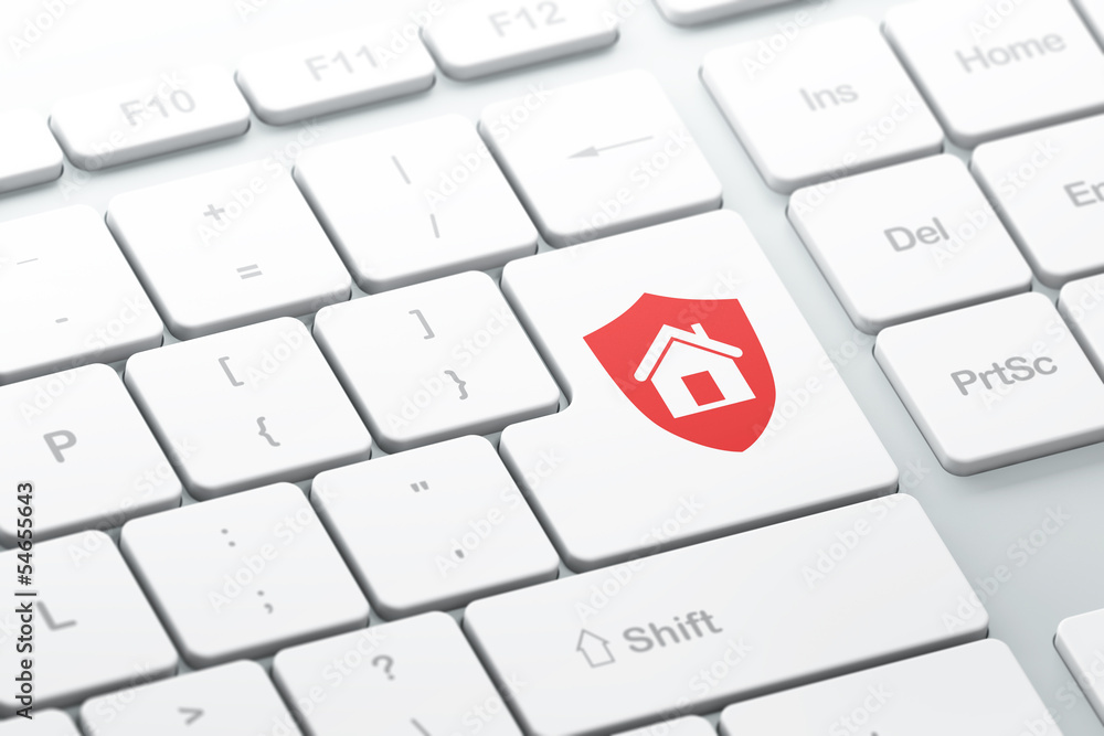 Security concept: Shield on computer keyboard background Security concept: Shield on computer keyboard background