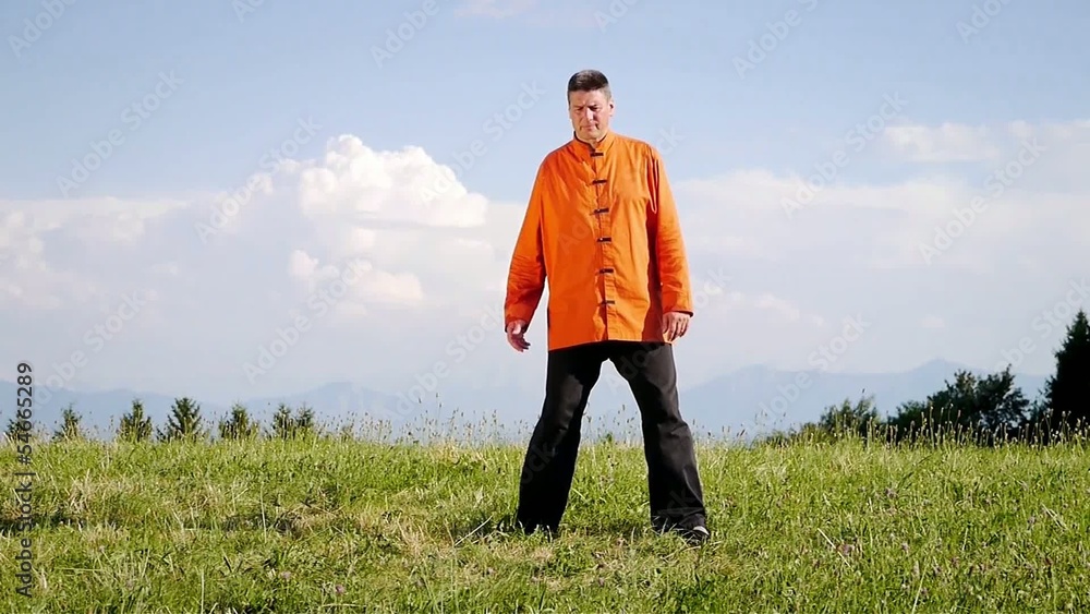 Man doing Qi Gong outdoors