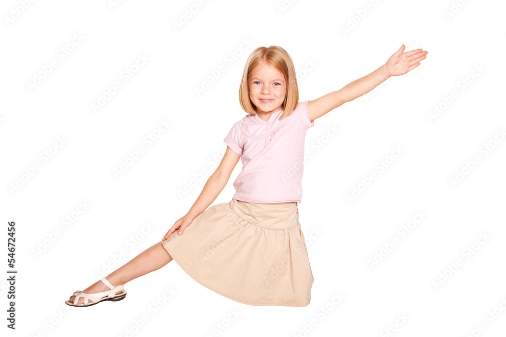 Naklejka premium Little girl dancing. Isolated on white